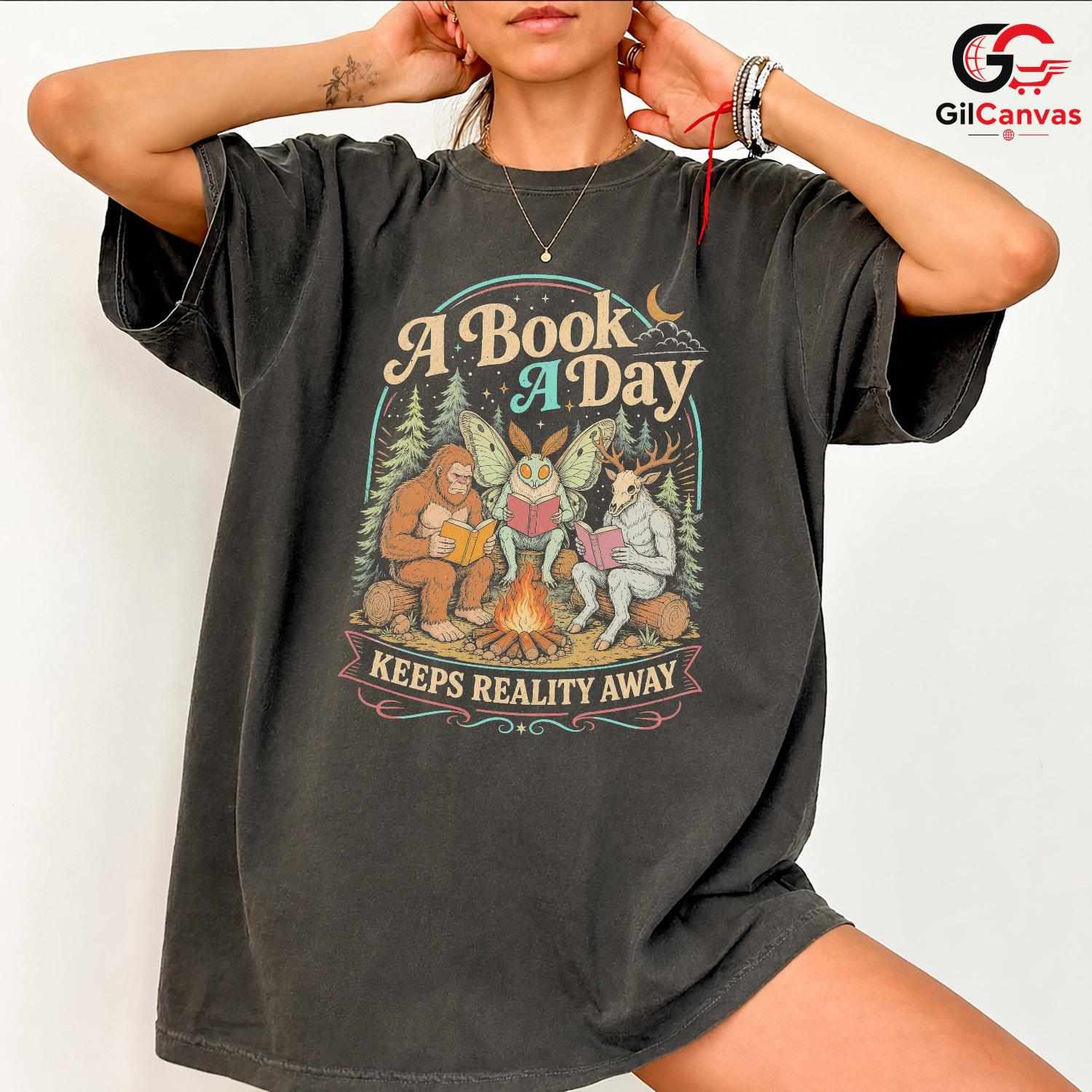 Book A Day Keeps Reality T-Shirt Cryptid Book Lover Gift Unisex Graphic Apparel